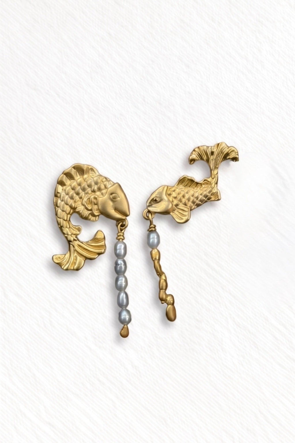 Duel fish earrings